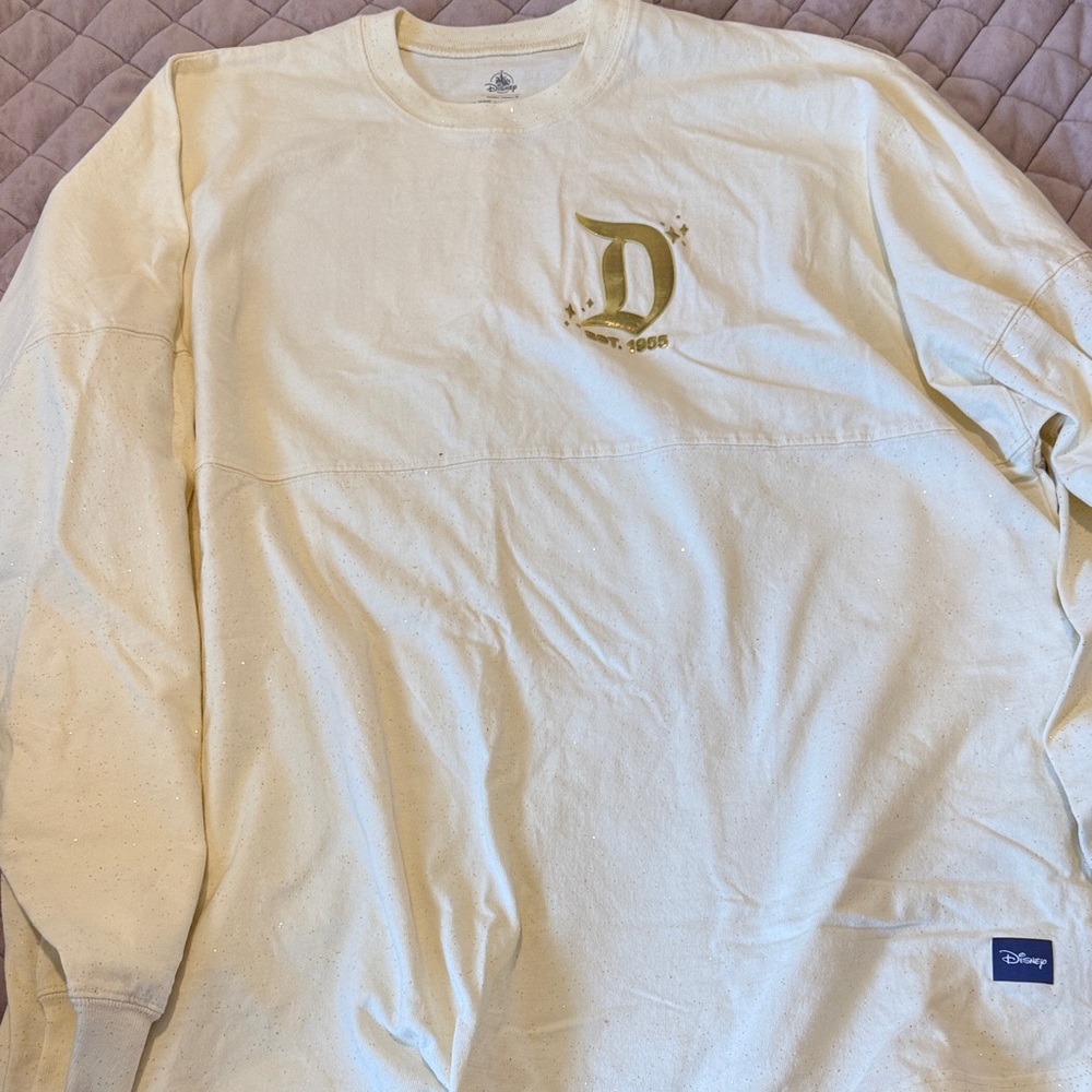 Disney Men's Cream Long Sleeve Sweatshirt with Gold 'D' Graphic